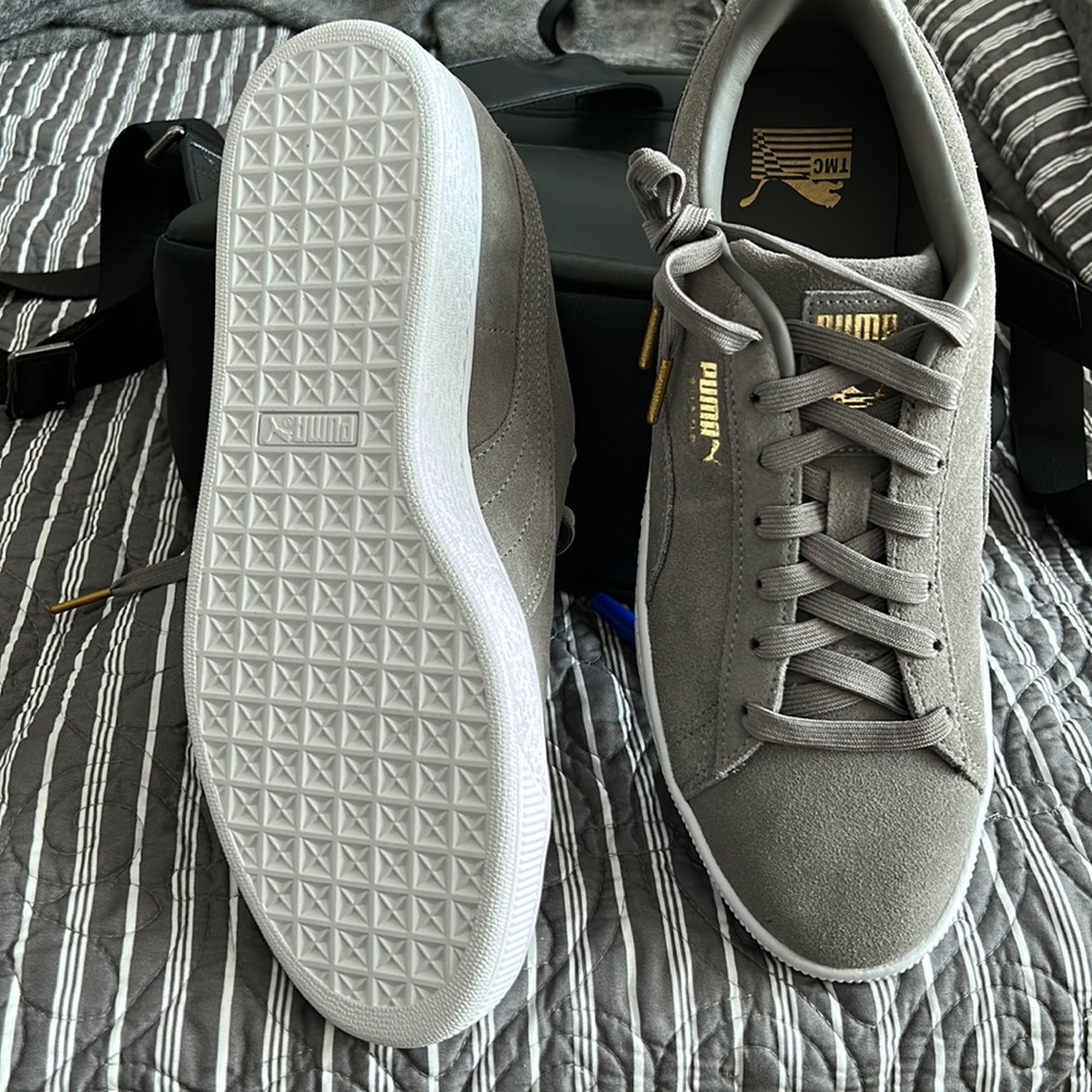 Men’s Puma, size 10.